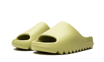 yeezy-slide-resin-restock-pair-raven-sneakers