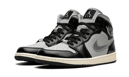 air-jordan-1-mid-black-chrome-raven-sneakers