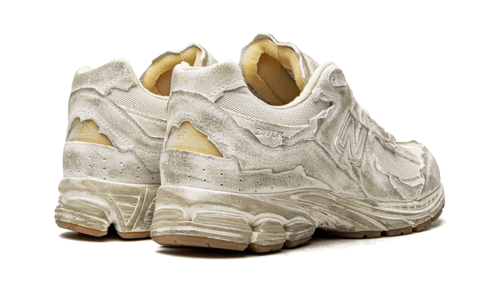 2002r-protection-pack-distressed-raven-sneakers