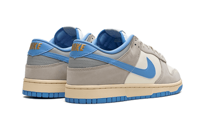 dunk-low-athletic-department-university-blue-raven-sneakers