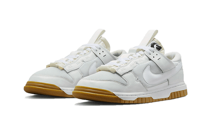 dunk-low-remastered-white-gum-raven-sneakers